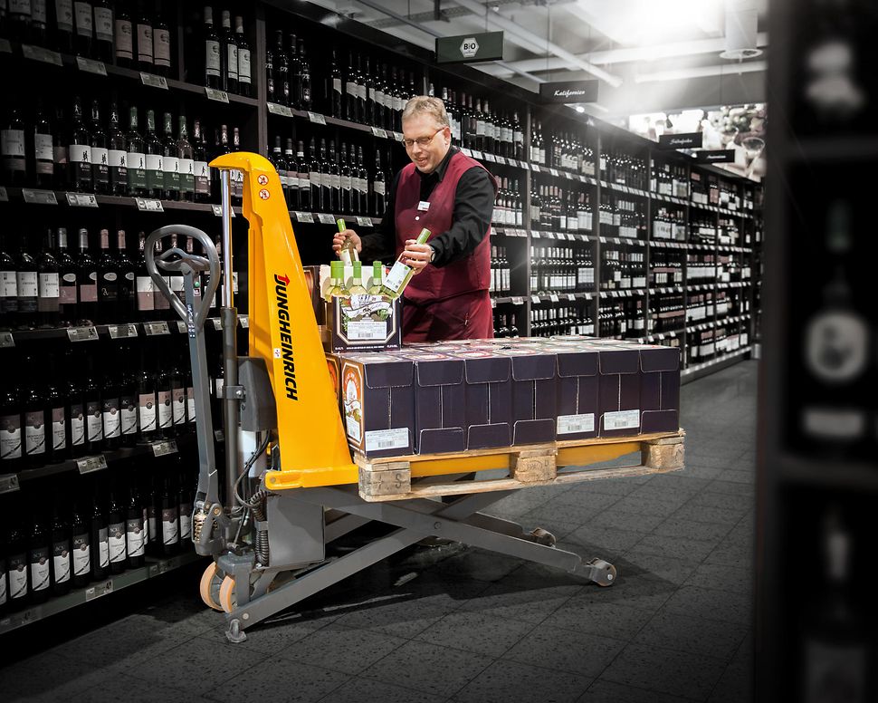 Porta-paletes de tesoura em utilização