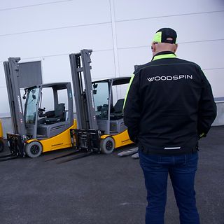 Woodspin logo ja trukit