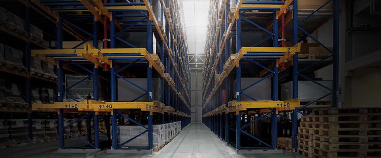 Multi-bay racking for narrow aisle