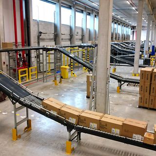 Article pilier - COMPRENDRE LA PALETTISATION AUTOMATIQUE : UNE INTRODUCTION