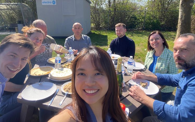 Maureen with colleagues at the table