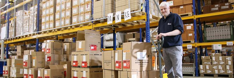 action medeor logo with the number 2025 cast into the ground