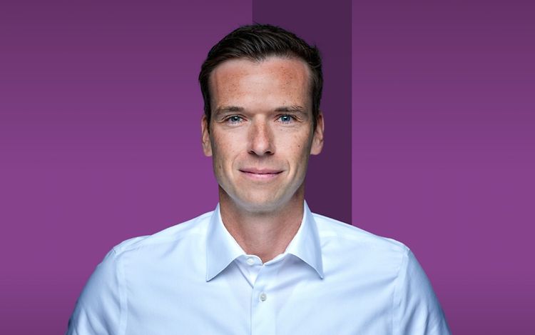 Torsten Gerhardt looks straight into the camera and smiles.